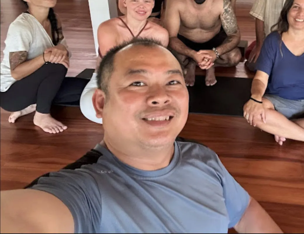 Vuth with a group after a self-care session